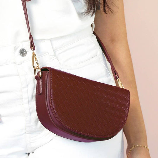 Woven Vegan Leather Half Moon Crossbody Bag in Burgundy