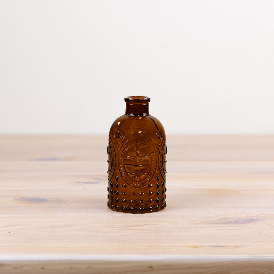 Brown glass bud vase