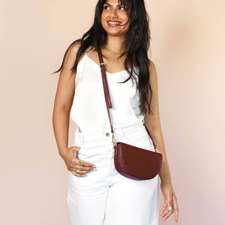 Woven Vegan Leather Half Moon Crossbody Bag in Burgundy