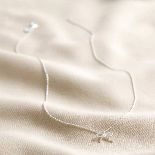 Tiny Pearl Bow Necklace in Silver