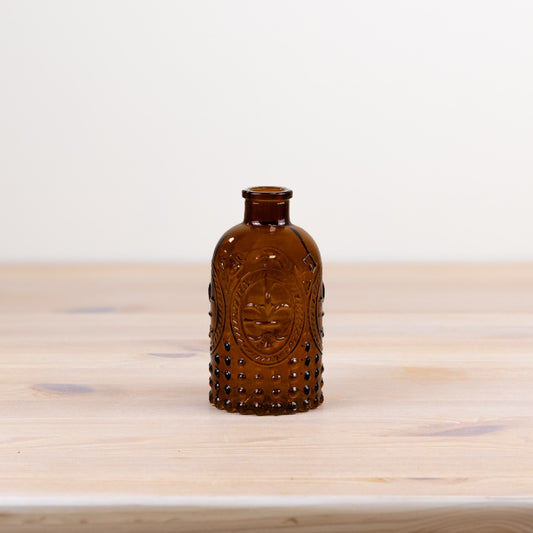 Brown glass bud vase